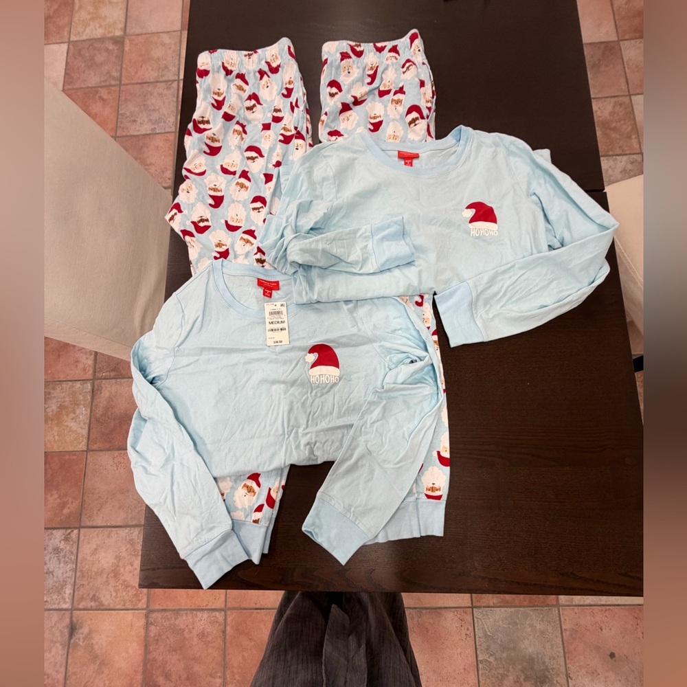 Two size medium pajamas
One new extra large men’s pajamas(not in group pic)